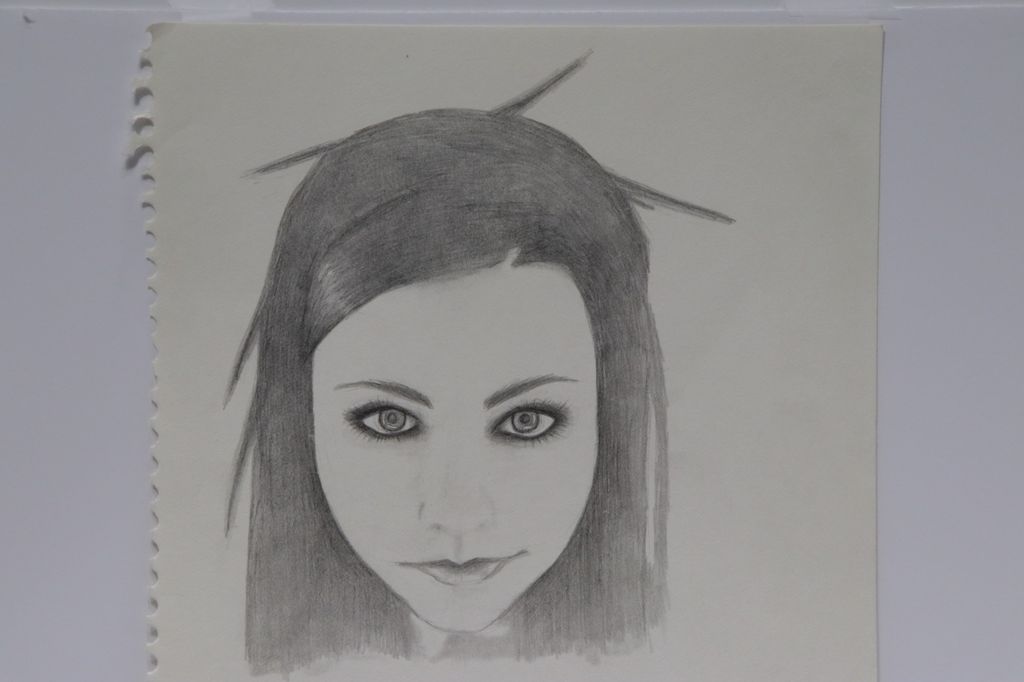 Graphite portrait drawing titled Evanescent.